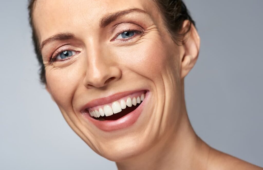 Anti-Aging - Beautiful laughing mature woman in studio