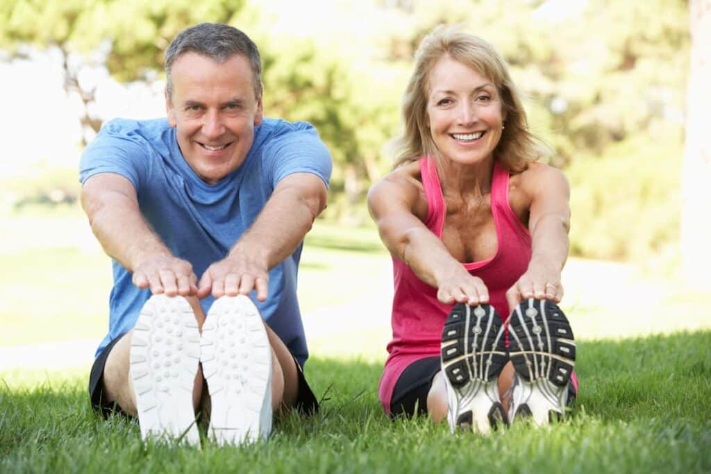 Skinny Shot weight loss treatment - Senior Couple Exercising In Park